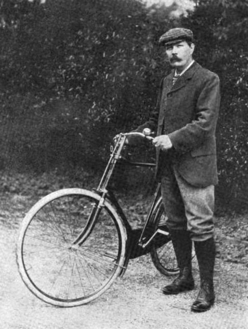 Arthur Conan Doyle (1859&ndash;1930) with bicycle