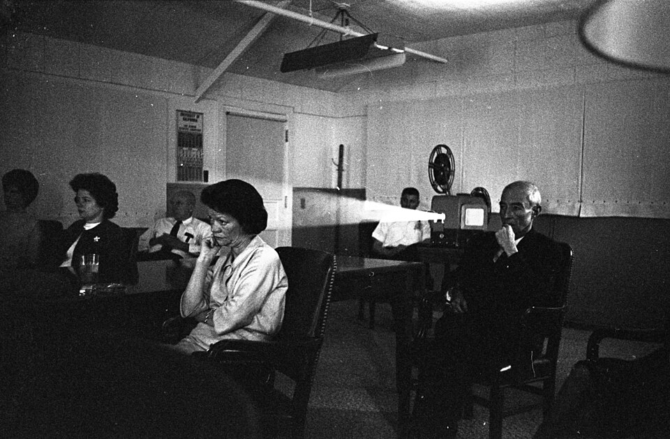 J. Robert Oppenheimer and Kitty Oppenheimer watch Ten Seconds that Shook the World