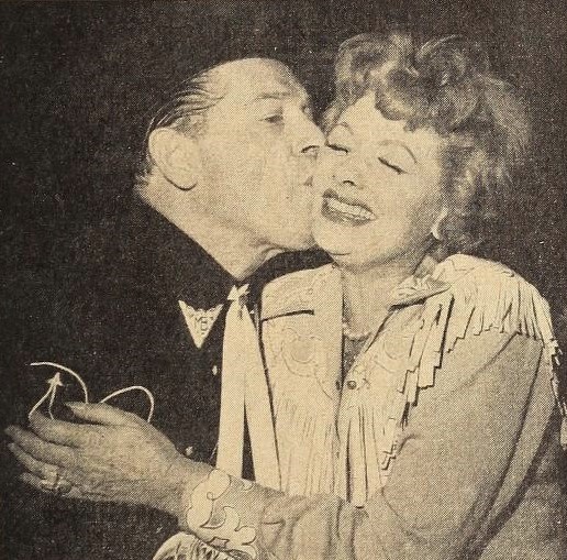 Lucille Ball looked so happy, Milton Berle had to kiss her, 1960