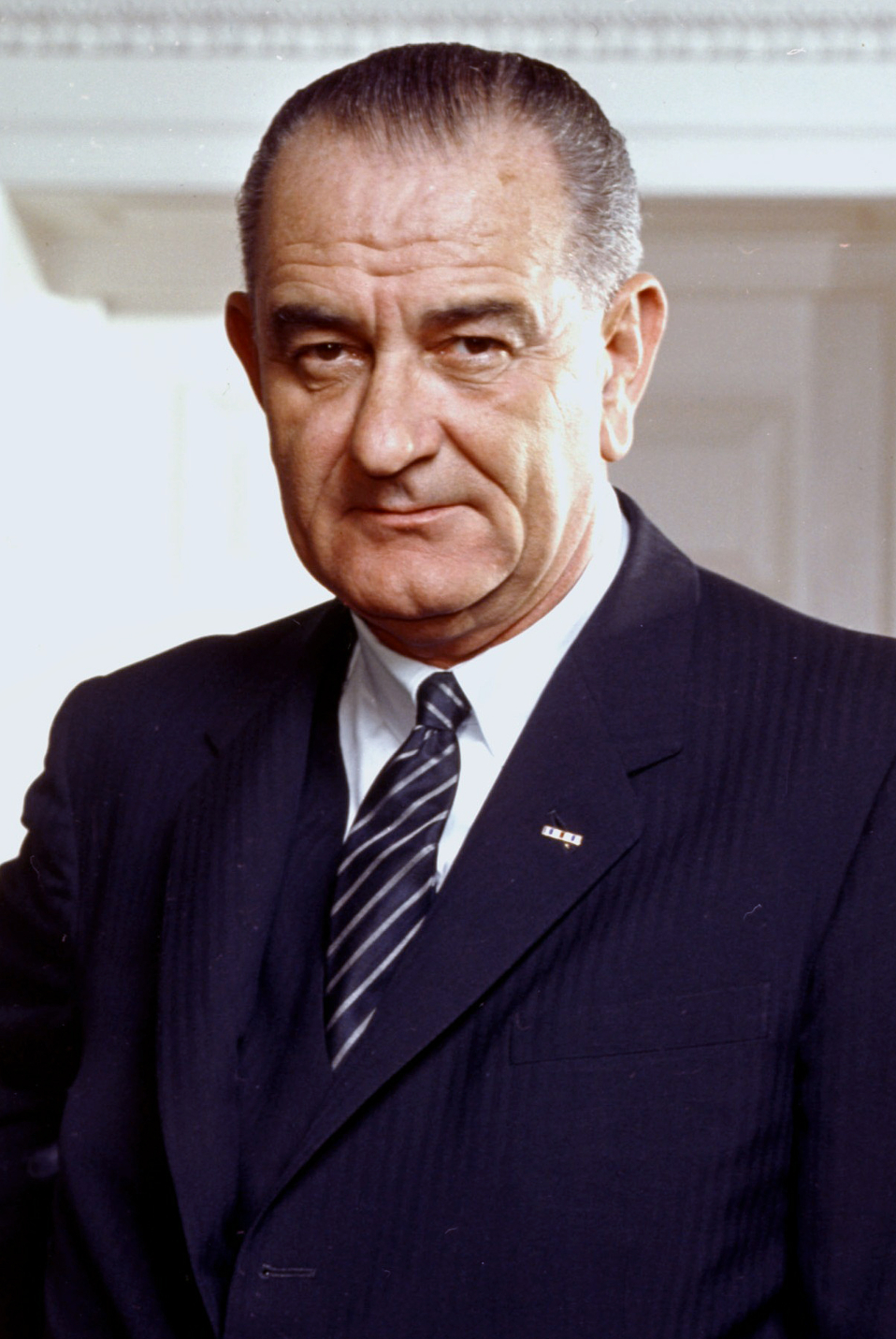 Lyndon B. Johnson, photo portrait, leaning on chair, color, cropped