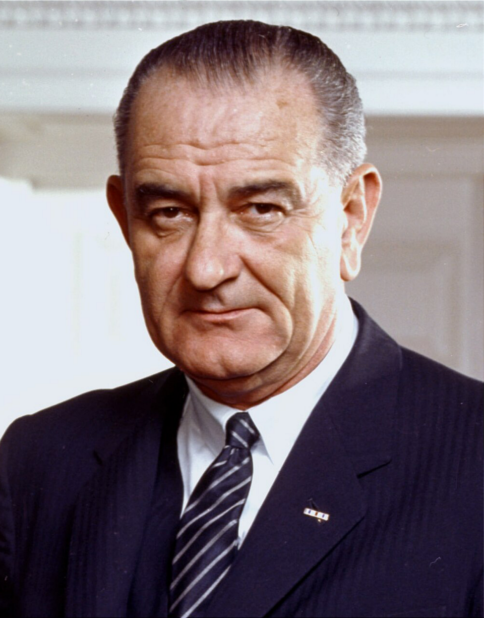 Lyndon B. Johnson, photo portrait, leaning on chair, color cropped (cropped)
